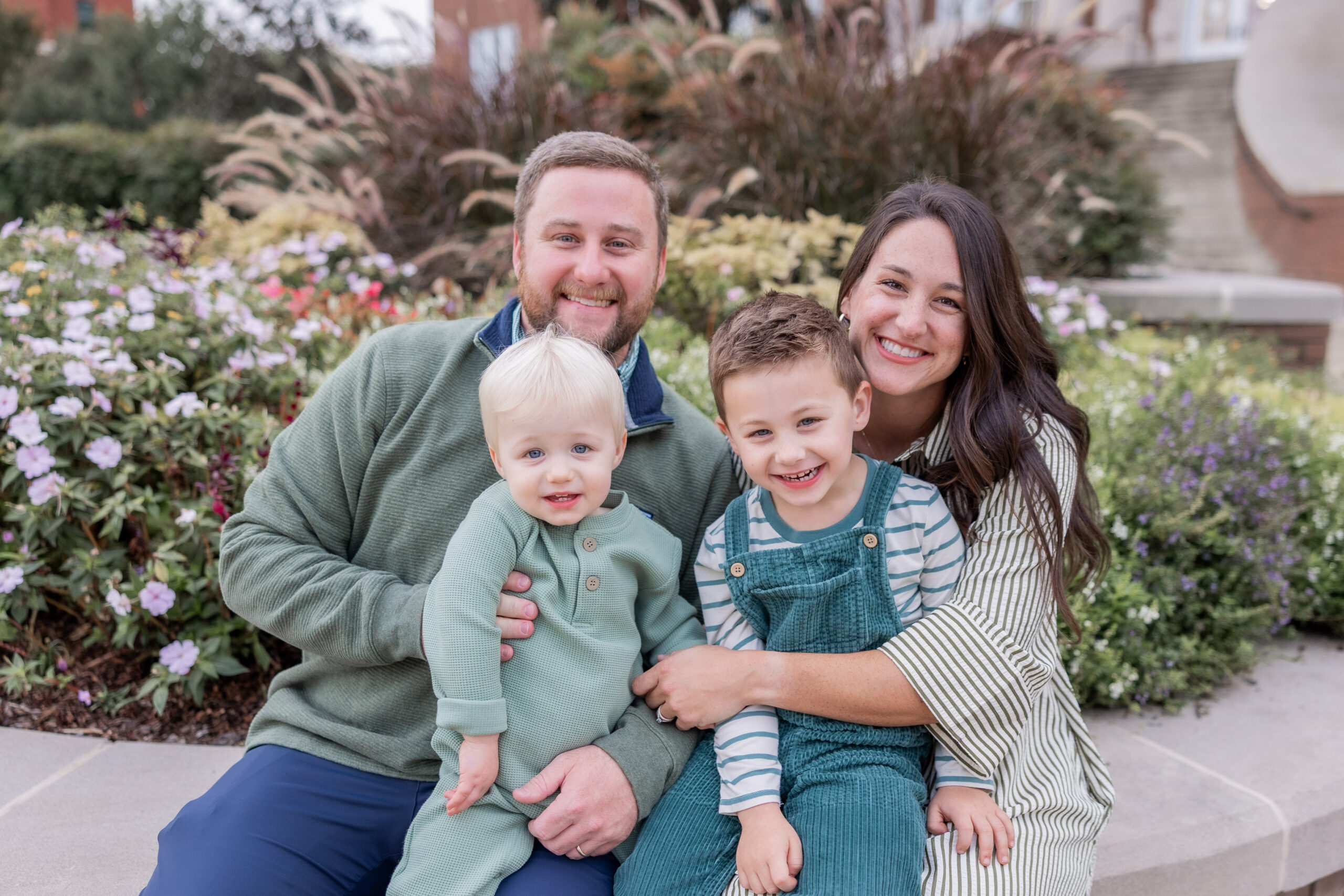 starkville family posing for pictures on Mississippi State University Campus