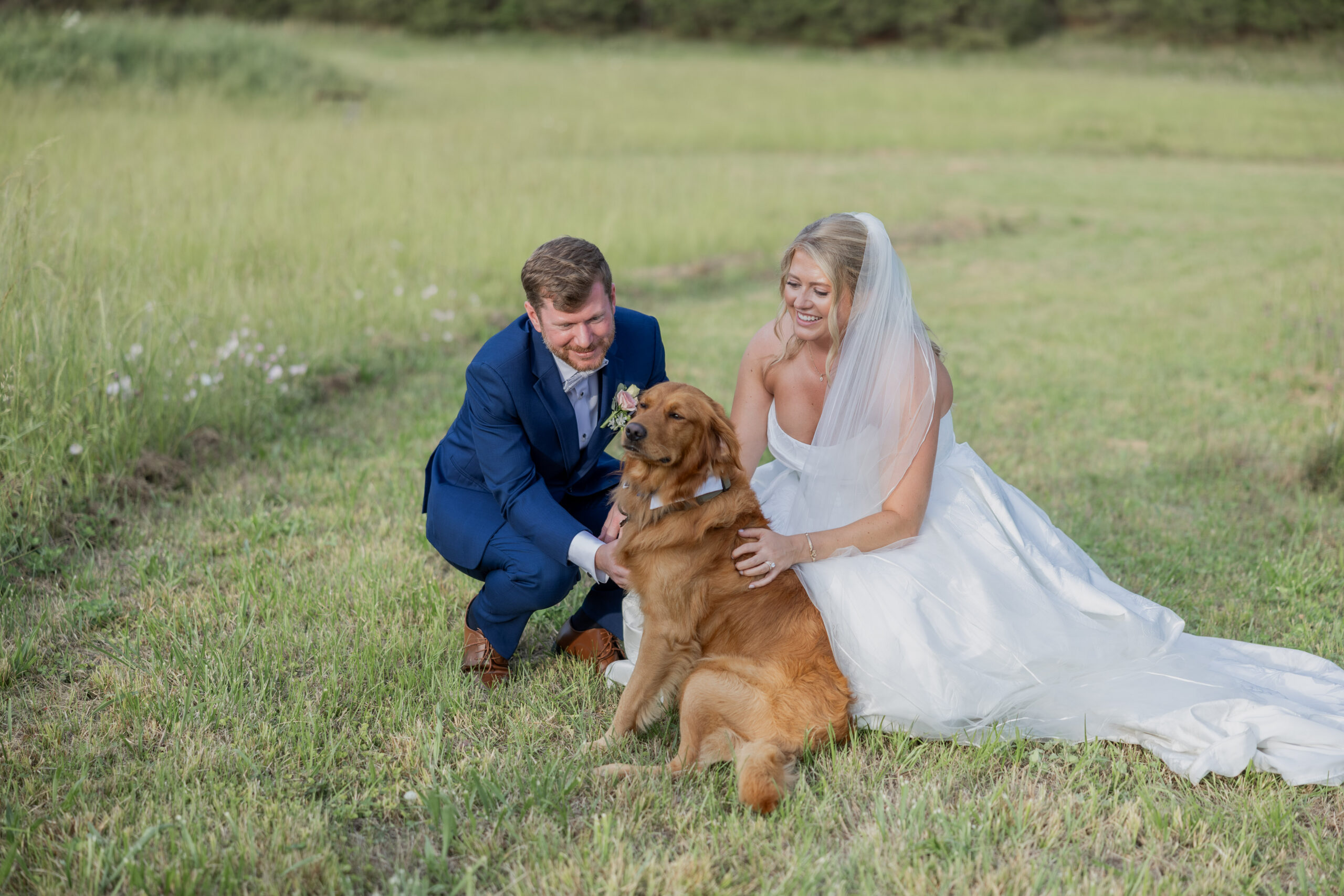 Bride and Groom with their dog at their wedding in Starkville, MS at The Hill and Moor.