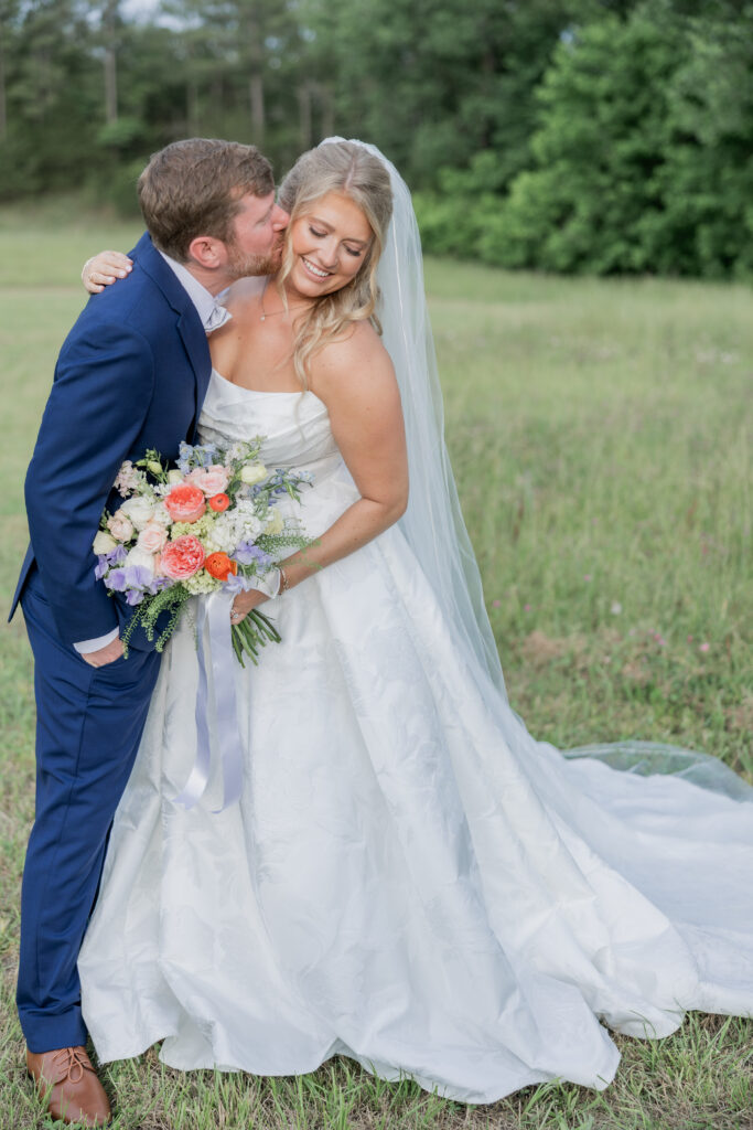 Bride and Groom at a wedding in Starkville, Mississippi at The Hill and Moor.