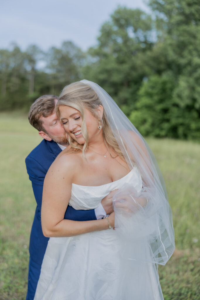 Bride and Groom at a wedding in Starkville, Mississippi at The Hill and Moor.