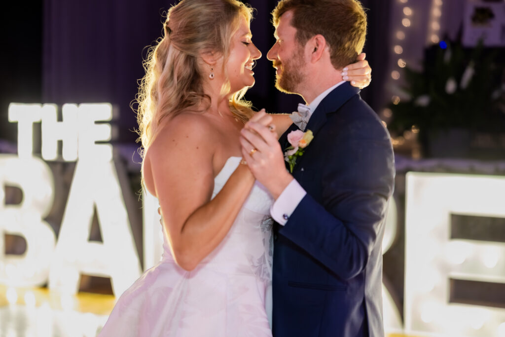 Bride and Groom dancing at their wedding in Starkville, Mississippi at The Hill and Moor.