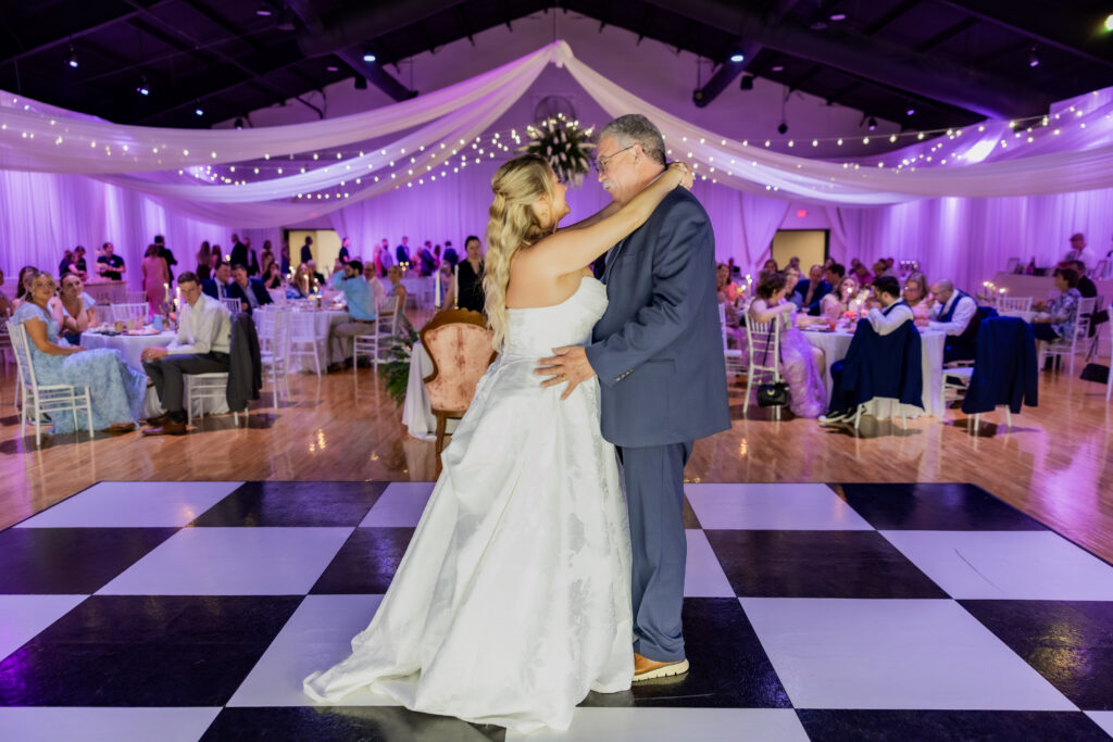 Bride and dad dancing at a wedding in Starkville, Mississippi at The Hill and Moor.