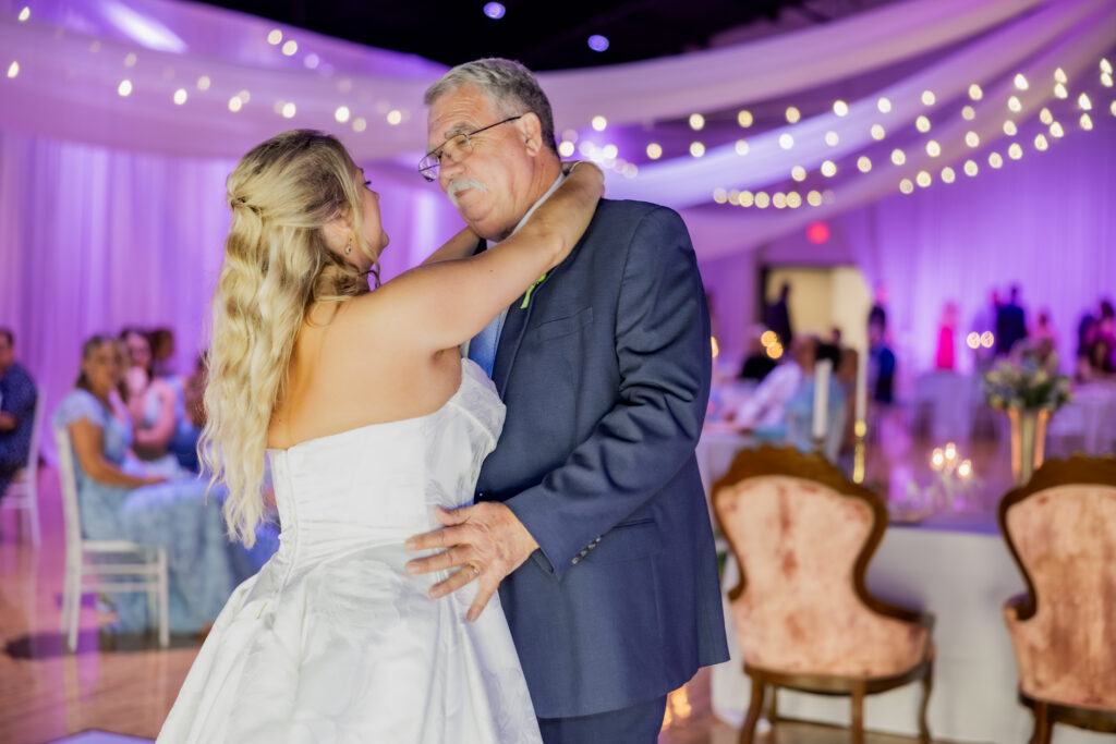 Bride and dad dancing at a wedding in Starkville, Mississippi at The Hill and Moor.