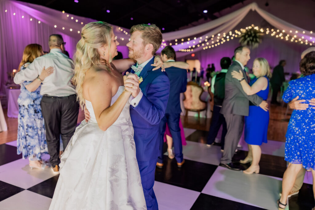 Bride and Groom dancing at their wedding in Starkville, Mississippi at The Hill and Moor.