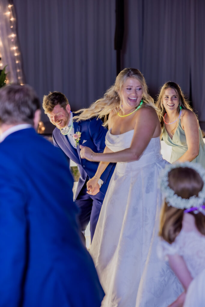 Bride and Groom dancing at their wedding in Starkville, Mississippi at The Hill and Moor.