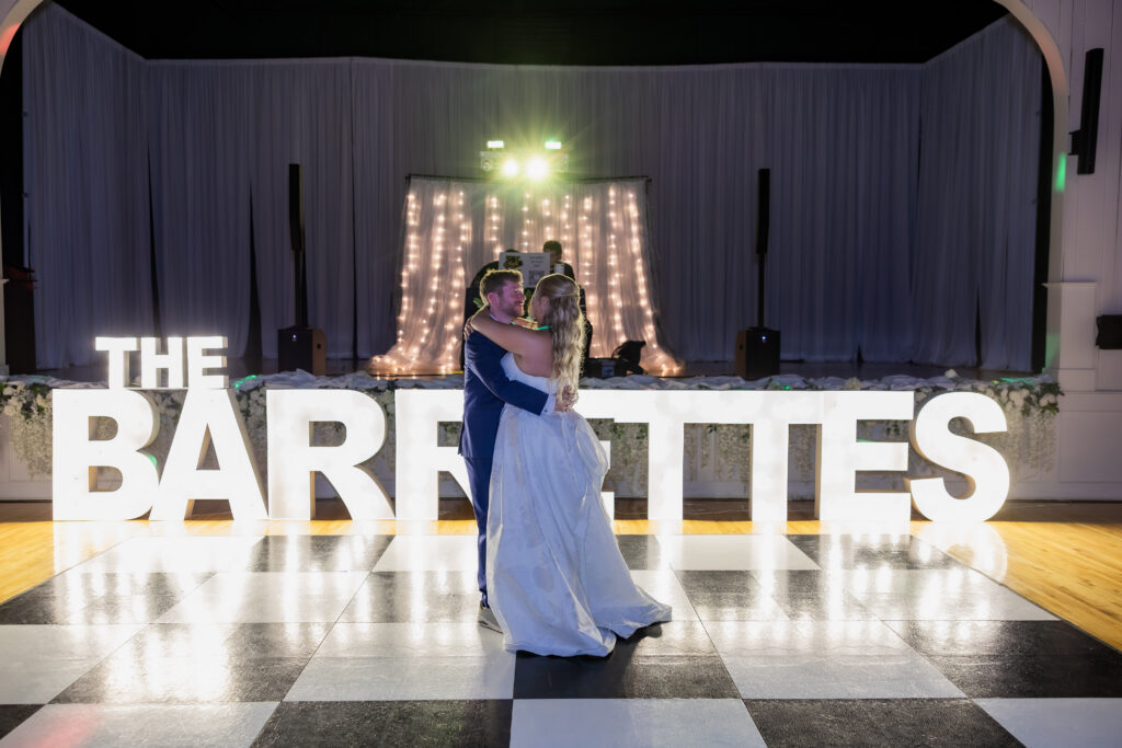 Bride and Groom dancing at their wedding in Starkville, Mississippi at The Hill and Moor.