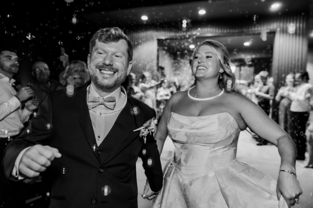 Bride and Groom bubble exit from their wedding in Starkville, Mississippi at The Hill and Moor.