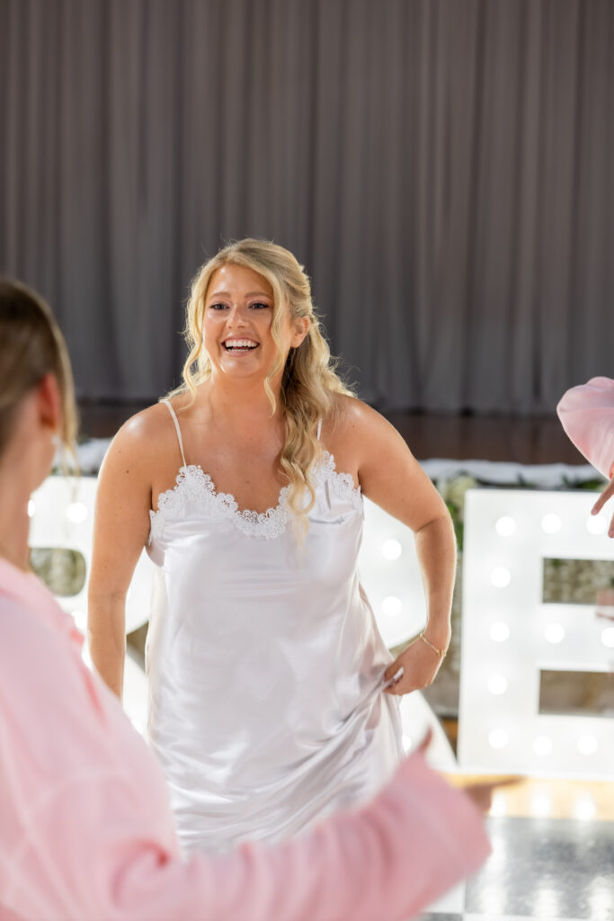 Bride getting ready at a wedding in Starkville, Mississippi at The Hill and Moor.