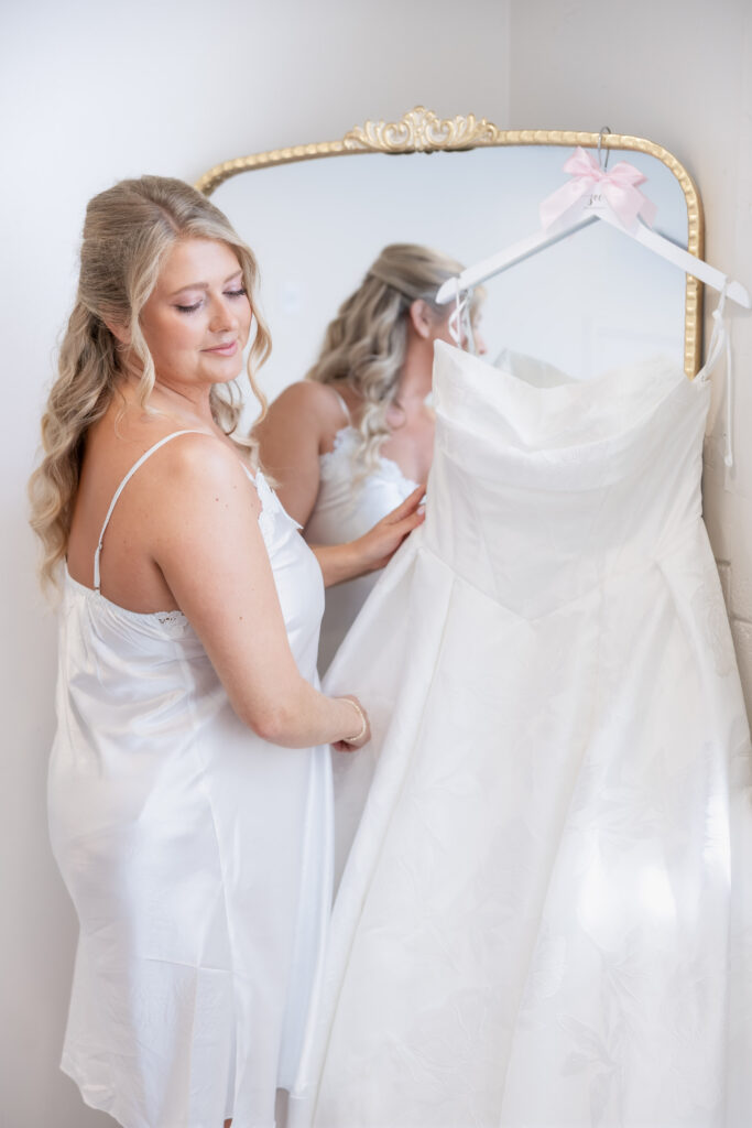 Bride getting ready at a wedding in Starkville, Mississippi at The Hill and Moor.