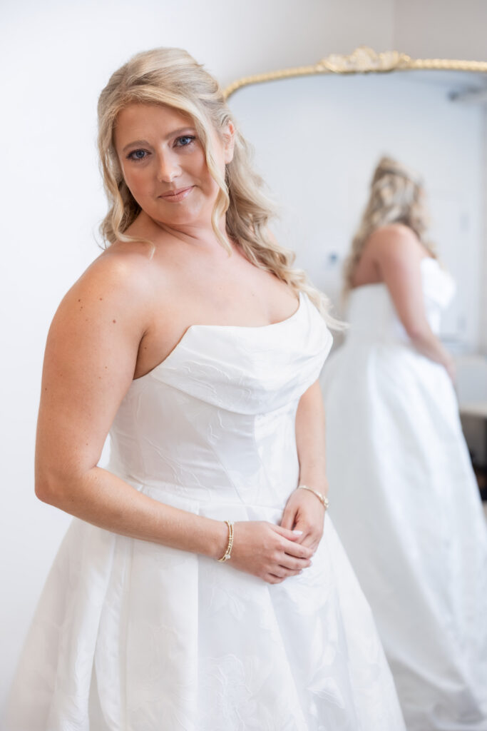 Bride getting ready at a wedding in Starkville, Mississippi at The Hill and Moor.