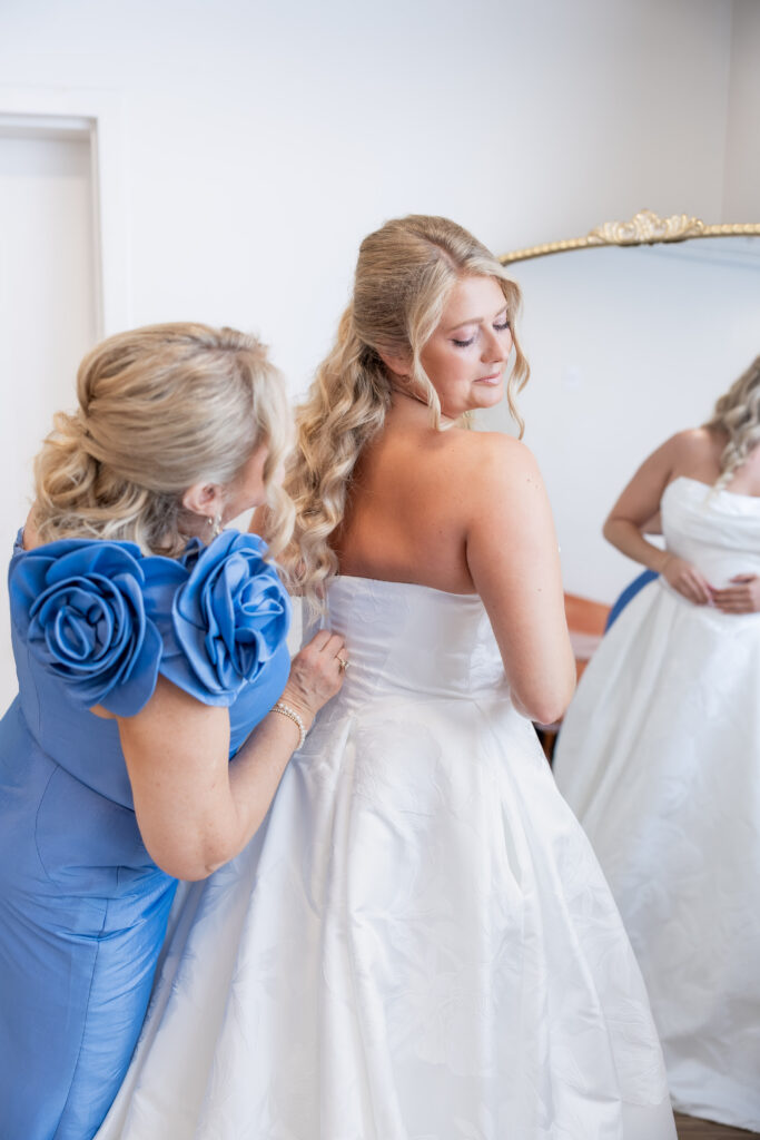 Bride getting ready at a wedding in Starkville, Mississippi at The Hill and Moor.
