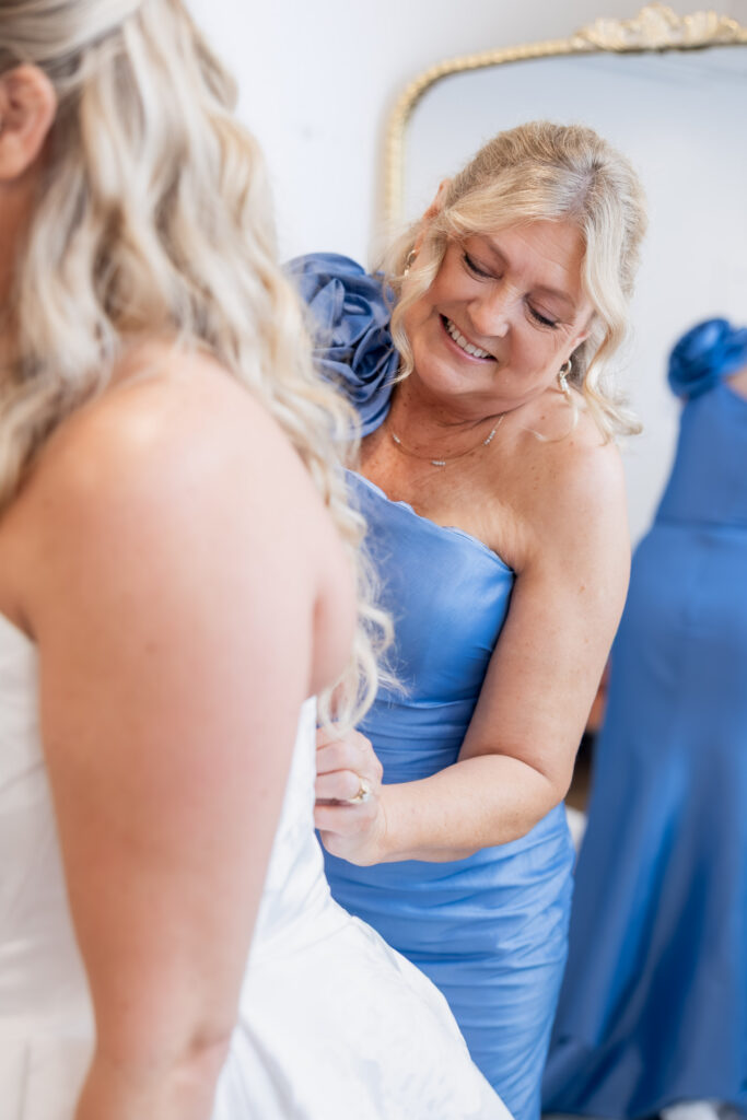 Bride getting ready at a wedding in Starkville, Mississippi at The Hill and Moor.