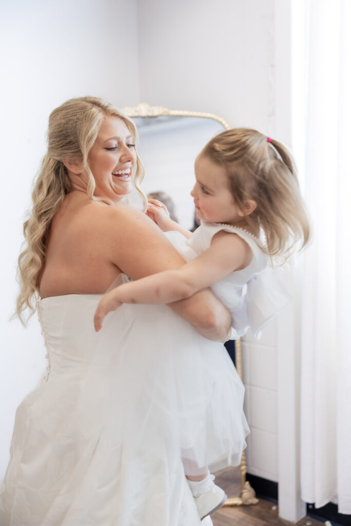 Bride getting ready at a wedding in Starkville, Mississippi at The Hill and Moor.