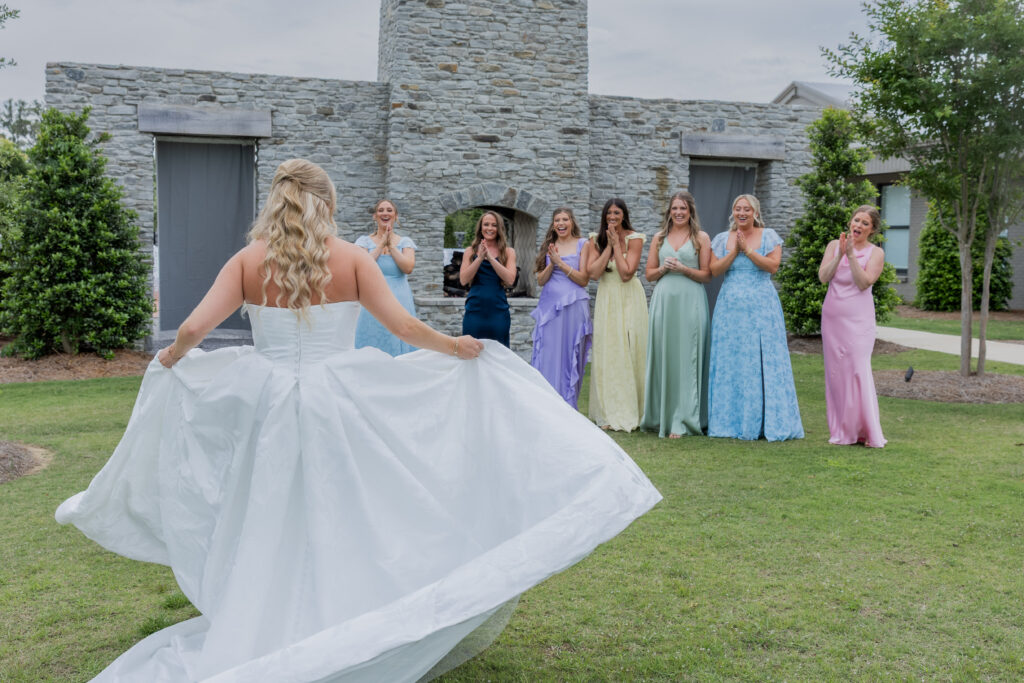 Bride and bridal party at a wedding Flowers in Starkville, Mississippi at The Hill and Moor.