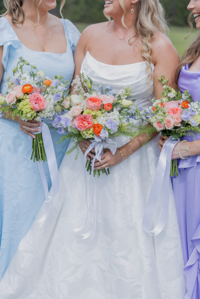 Bride and bridal party at a wedding Flowers in Starkville, Mississippi at The Hill and Moor.