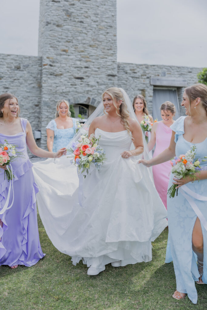 Bride and bridal party at a wedding Flowers in Starkville, Mississippi at The Hill and Moor.