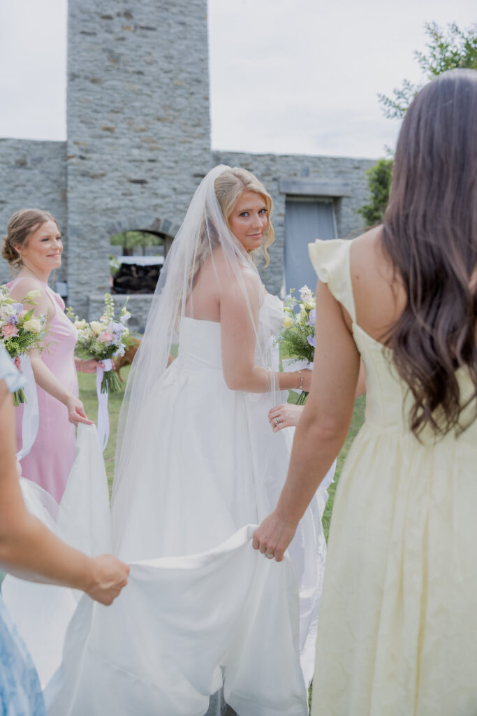 Bride and bridal party at a wedding Flowers in Starkville, Mississippi at The Hill and Moor.