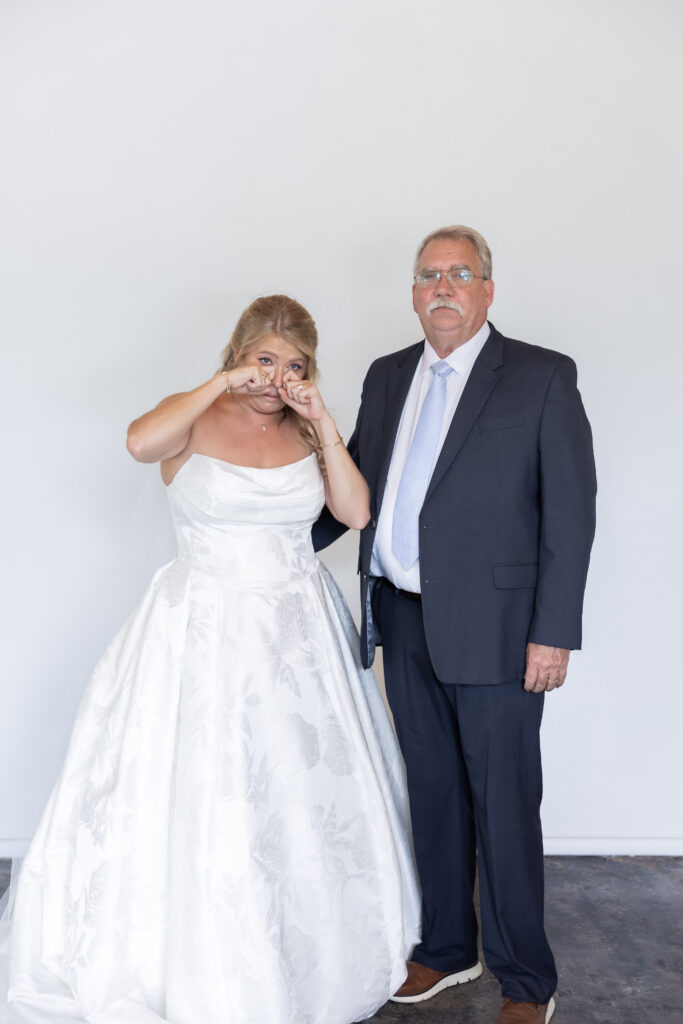 Bride and dad at a wedding in Starkville, Mississippi at The Hill and Moor.