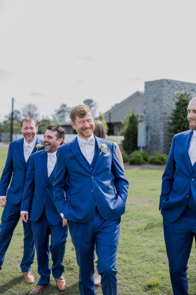Groom and bridal party at a wedding in Starkville, Mississippi at The Hill and Moor.