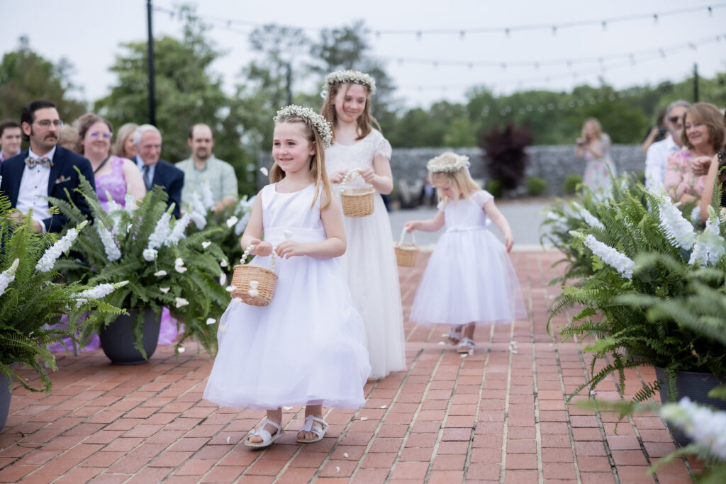 Flower girls at a wedding in Starkville, Mississippi at The Hill and Moor.
