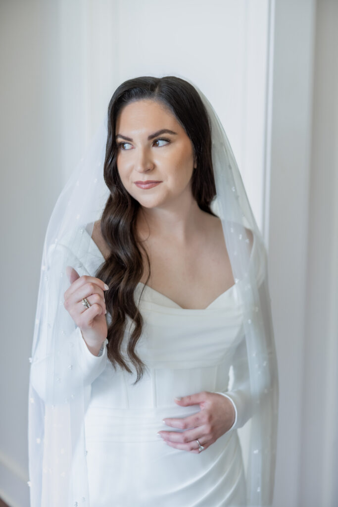 Bride getting ready for wedding in Starkville, MS.